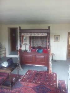 Four poster bed in hall